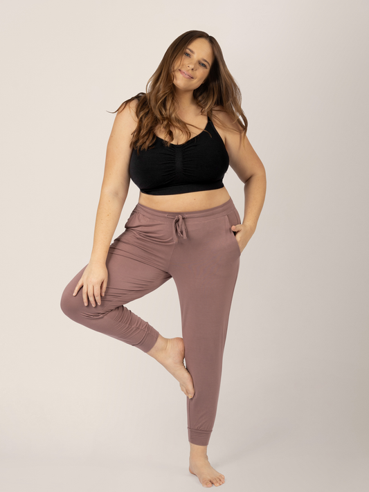 Busty model wearing the Sublime® Bamboo Hands-Free Pumping Lounge & Sleep Bra in Black @model_info:Ali is wearing a Large Busty.